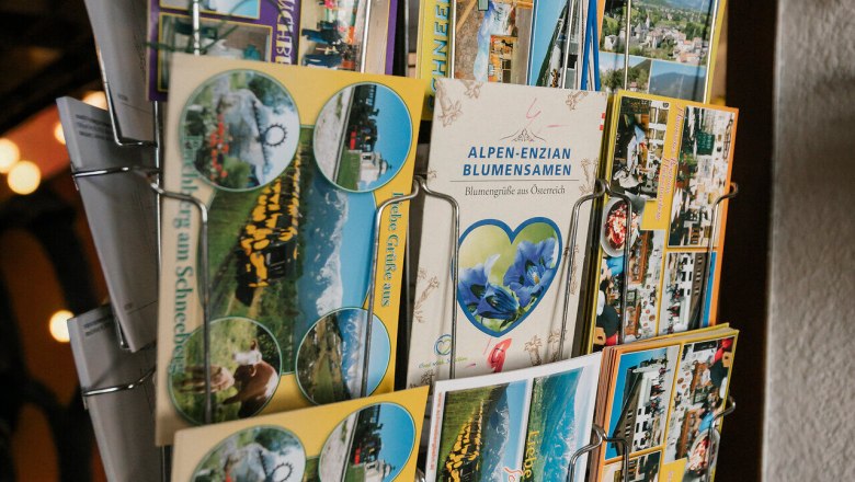 Berghaus Hochschneeberg, Schneeberg, Hut, Schneebergland, Vienna Alps in Lower Austria, © Wiener Alpen/Sophie Menegaldo Postcard stand with postcards of the Schneeberg at the Berghaus Hochschneeberg
