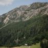 The Edelwei&szlig; Hut on the Schneeberg, nestled between the forest and the rocky massif