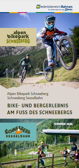 Titelblatt mit zwei Mountainbikern im Alpen Bikepark Schneeberg und Gästen bei der Schneeberg Sesselbahn.