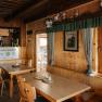 Rustic dining room with wooden tables at the Edelwei&szlig;h&uuml;tte on Schneeberg