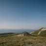 A fisherman's cabin on Schneeberg, nestled amid the vast alpine mountain landscape