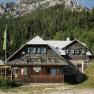 Exterior view of the Edelwei&szlig; Hut on Schneeberg with the rock massif in the background